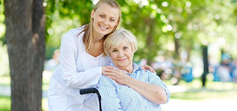 Woman Caregiver and Elderly Woman